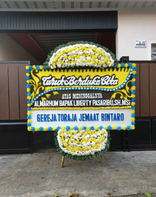 Papan Bunga Duka di Jampiroso